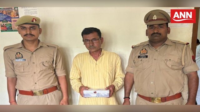 पुलिस गिरफ्त में पत्नी पर फायर करने का आरोपी